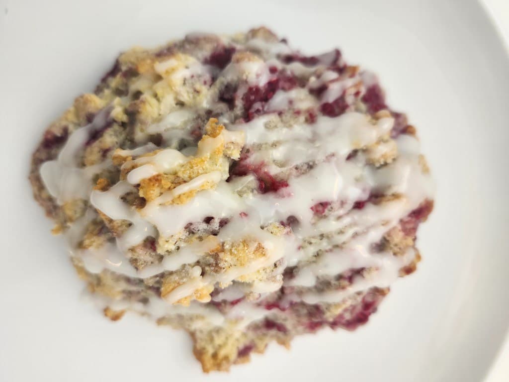 Blueberry scone drizzled with glaze